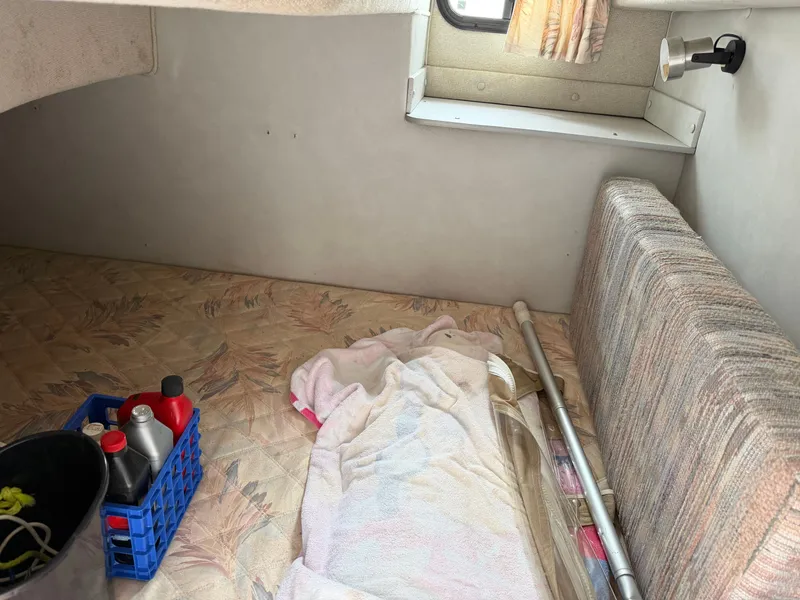 Slide: The Image of Interior of 1990 Chaparral Signature 30 with storage and accessories. - 14