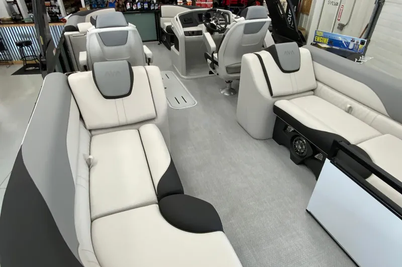 Slide: The Image of Luxurious interior of 2026 Avalon LSZ 2385 QL pontoon boat with plush seating. - 11