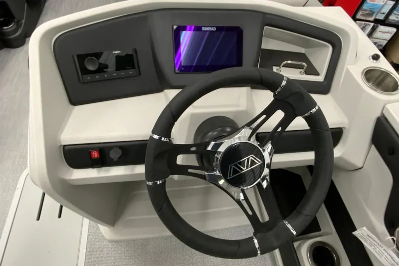 Slide: The Image of Steering console of 2026 Avalon LSZ 2385 QL with modern controls and display. - 13