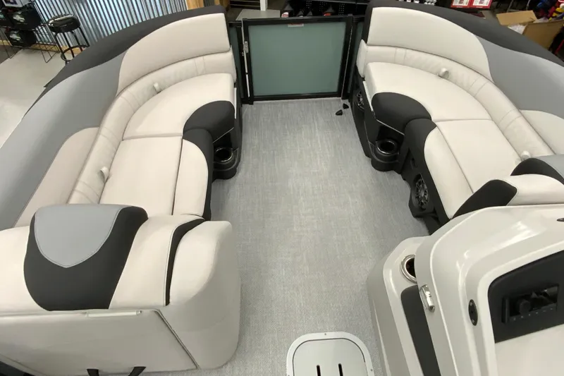 Slide: The Image of Luxurious interior of 2026 Avalon LSZ 2385 QL pontoon boat with plush seating. - 14