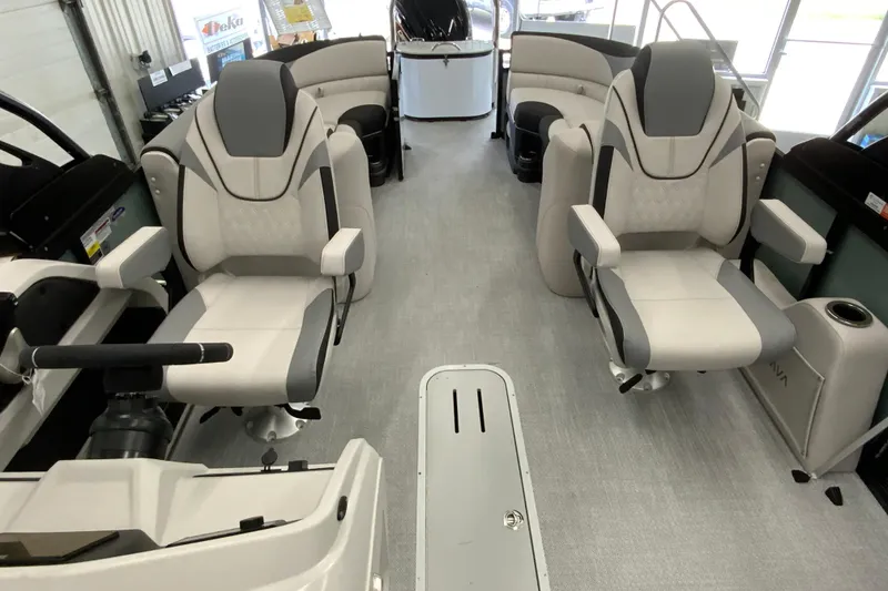 Slide: The Image of Luxurious interior of 2026 Avalon LSZ 2385 QL pontoon boat with plush seating. - 16