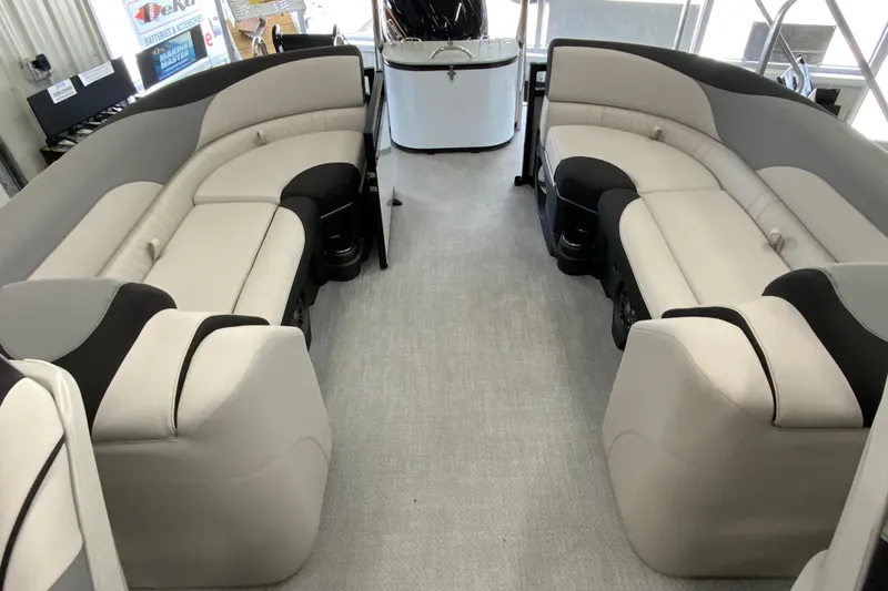 Slide: The Image of 2026 Avalon LSZ 2385 QL pontoon boat interior with plush seating and modern design. - 17
