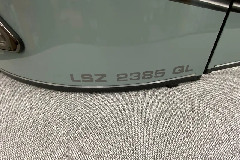 Slide: The Image of 2026 Avalon LSZ 2385 QL model nameplate on a sleek surface. - 29