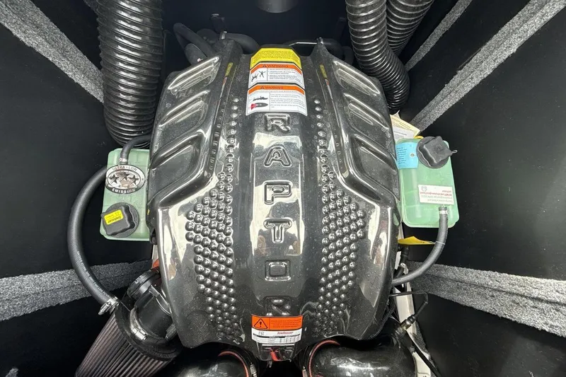 Slide: The Image of 2024 Supra SA 550 engine with Raptor branding, featuring detailed components and hoses. - 20