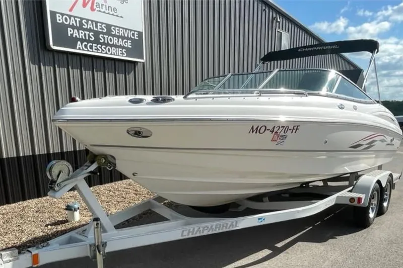 Slide: The Image of 2005 Chaparral 210 SSi boat on trailer at marine service center. - 2