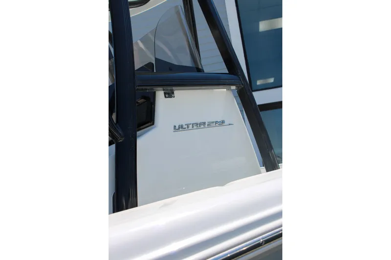 Slide: The Image of 2026 Sea Hunt Ultra 219 boat detail with logo and sleek design. - 32