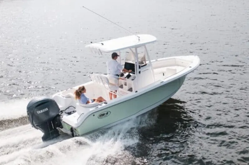 Slide: The Image of Manufacturer Provided Image: 2026 Sea Hunt Ultra 219 boat cruising on water with Yamaha engine. - 35
