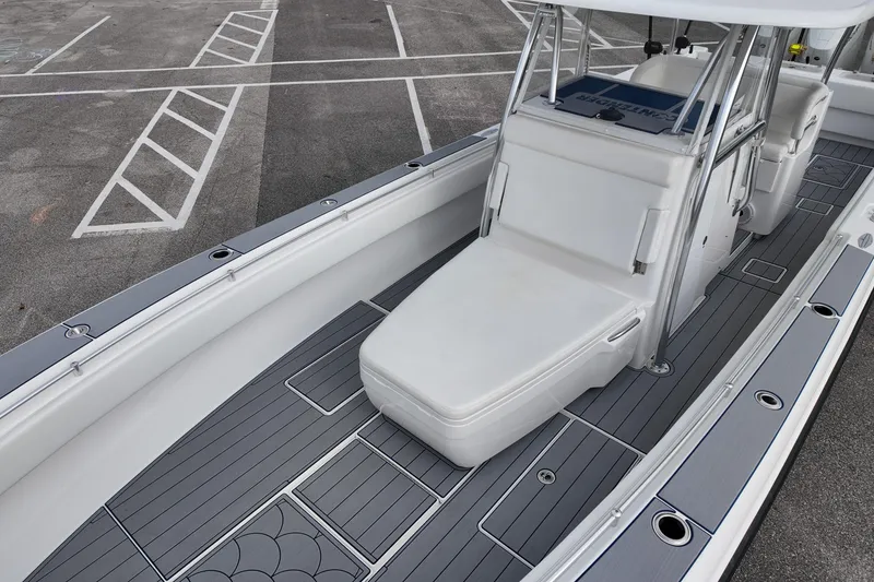 Slide: The Image of 2024 Contender 39 ST boat interior with sleek seating and modern design. - 11