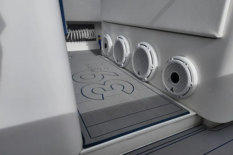 Slide: The Image of 2024 Contender 39 ST boat interior with speakers and deck design. - 16