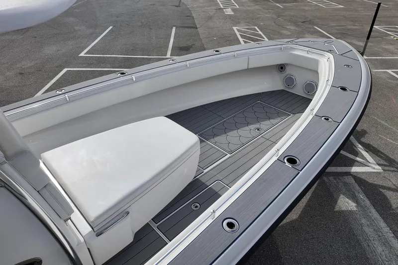 Slide: The Image of 2024 Contender 39 ST boat deck with sleek seating and modern design. - 9