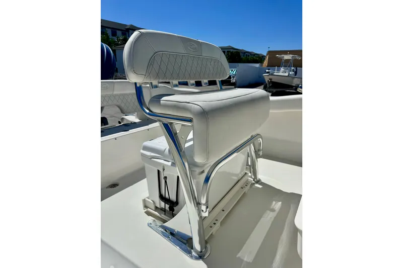 Slide: The Image of 2026 Key West 203 FS boat seat with sleek design and chrome accents. - 18