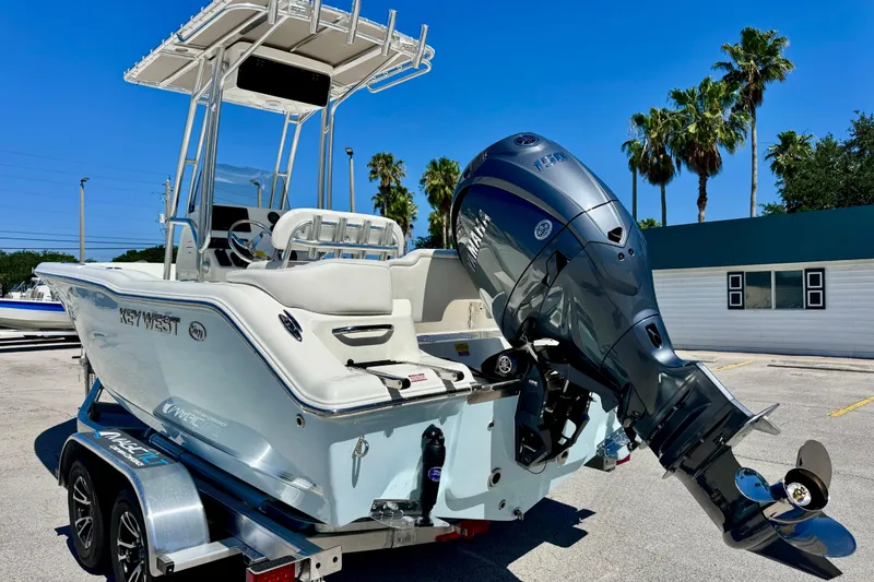 Slide: The Image of 2026 Key West 203 FS boat with Yamaha engine on trailer, sunny day. - 9