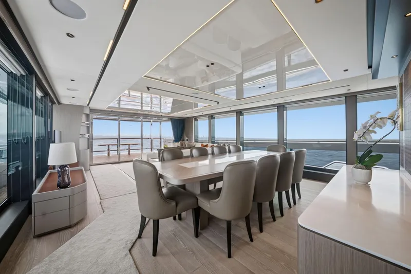 Slide: The Image of Luxurious dining area on 2024 Sunseeker 100 Yacht with ocean views and elegant decor. - 10