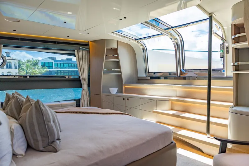 Slide: The Image of Luxurious interior of 2024 Sunseeker 100 Yacht with panoramic windows and elegant design. - 15