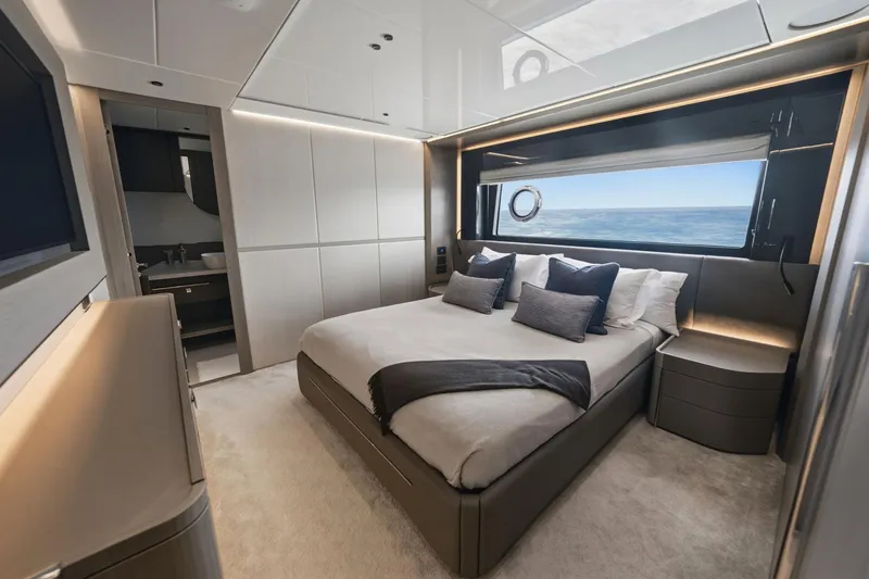 Slide: The Image of Luxurious bedroom interior of 2024 Sunseeker 100 Yacht with ocean view. - 20