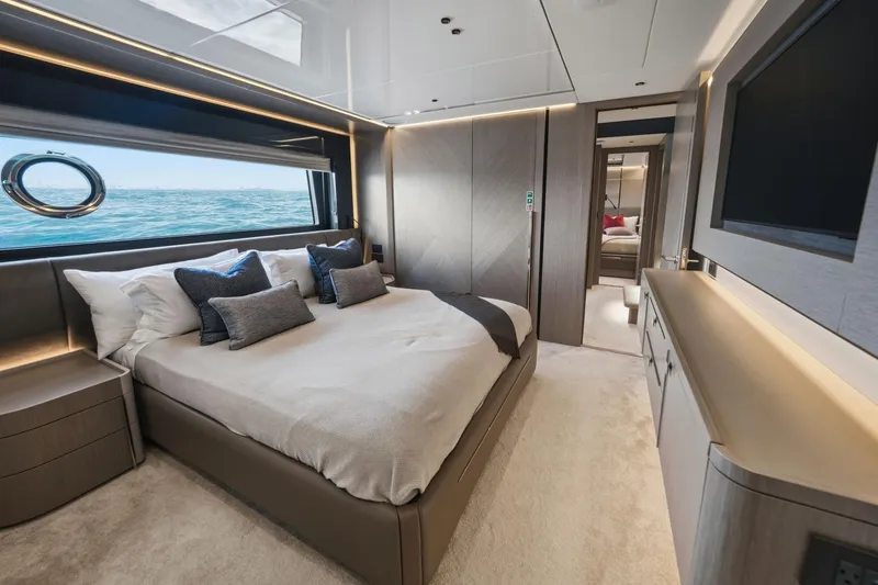 Slide: The Image of Luxurious bedroom interior of 2024 Sunseeker 100 Yacht with ocean view. - 21