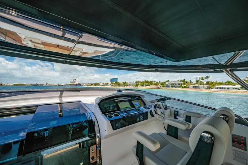 Slide: The Image of Luxurious 2024 Sunseeker 100 Yacht helm with panoramic ocean view. - 42