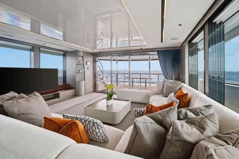 Slide: The Image of Luxurious interior of 2024 Sunseeker 100 Yacht with ocean view and elegant furnishings. - 9