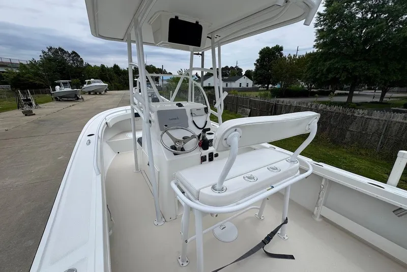 Slide: The Image of 2014 Steiger Craft 21 Tournament boat interior with helm and seating. - 5