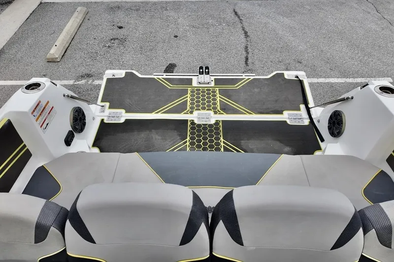 Slide: The Image of Rear view of 2020 Scarab 255 ID boat with stylish seating and deck design. - 14