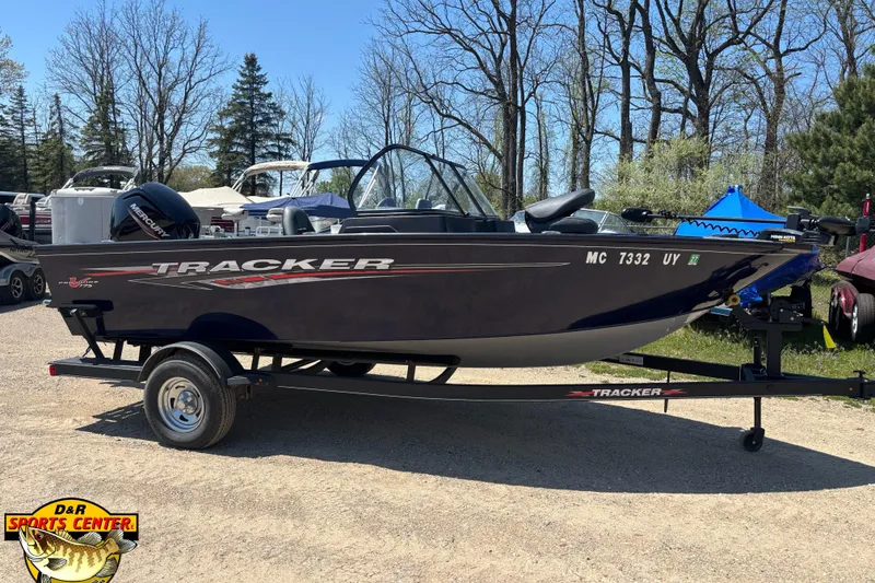 The Image of 2023 Tracker Pro Guide V-175 WT boat on trailer, parked outdoors at D&R Sports Center. - 0