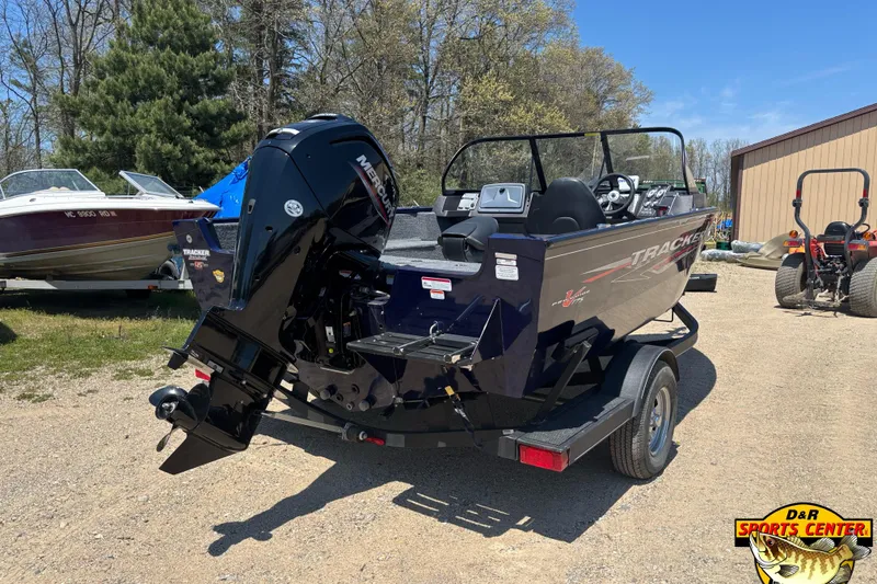 Slide: The Image of 2023 Tracker Pro Guide V-175 WT boat with Mercury engine on trailer. - 3