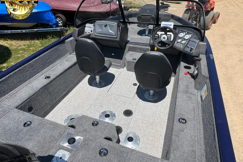 Slide: The Image of 2023 Tracker Pro Guide V-175 WT boat interior with dual seats and control panel. - 9