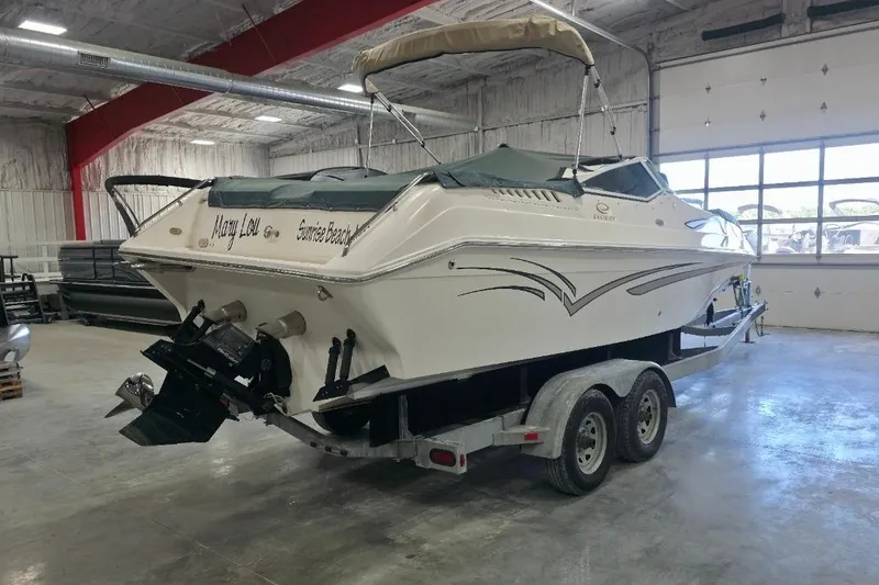 Slide: The Image of 2005 Envision 2900 Combo boat on trailer in indoor storage facility. - 5
