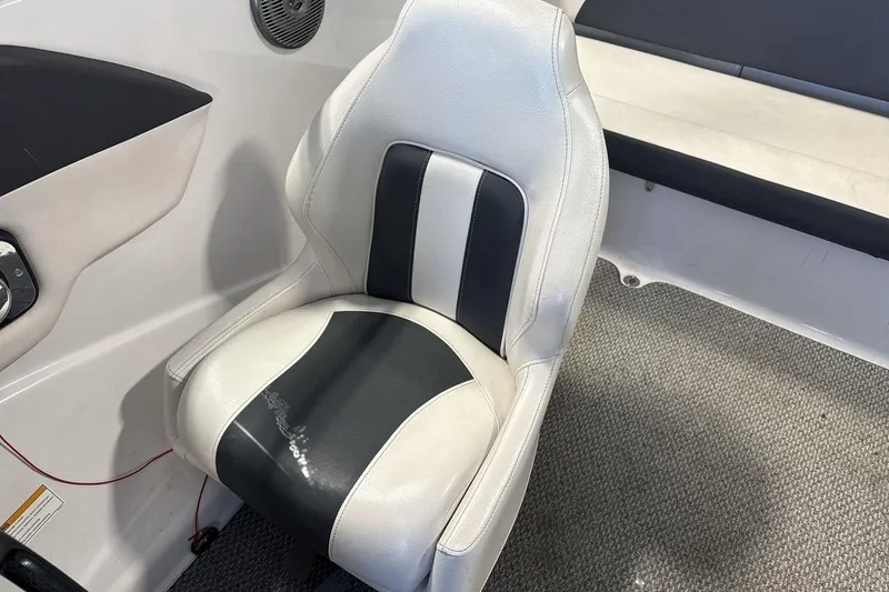 Slide: The Image of White and black seat in 2016 Four Winns 190 Freedom boat interior. - 13