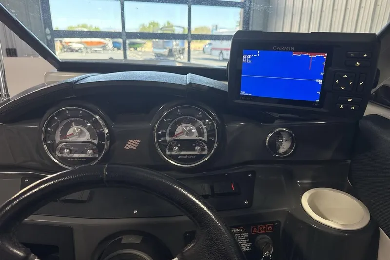 Slide: The Image of Dashboard of 2016 Four Winns 190 Freedom boat with Garmin navigation system. - 15