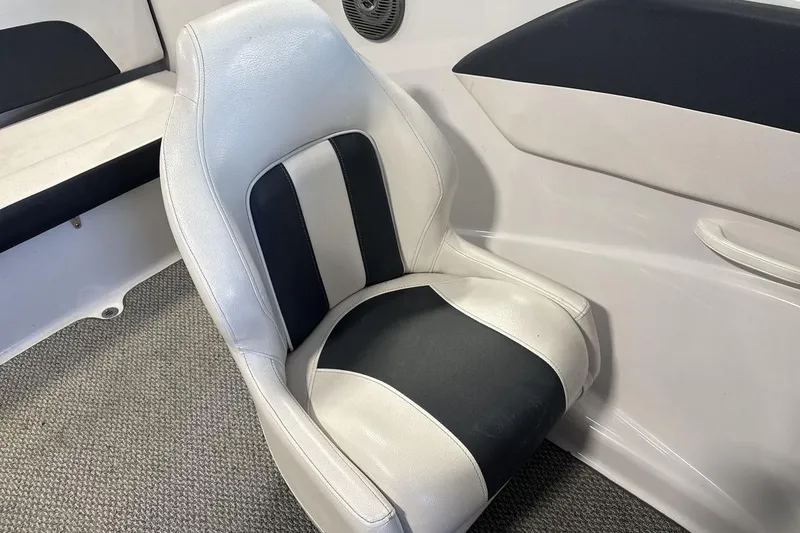 Slide: The Image of White and black seat in 2016 Four Winns 190 Freedom boat interior. - 17