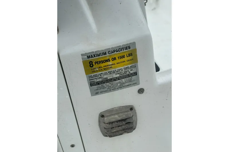 Slide: The Image of Capacity label on 2002 Polar 2300 Bay boat, indicating maximum of 8 persons or 1500 lbs. - 20