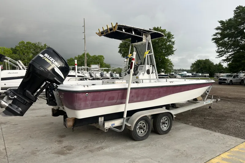 Slide: The Image of 2002 Polar 2300 Bay boat on trailer with Suzuki outboard motor. - 5