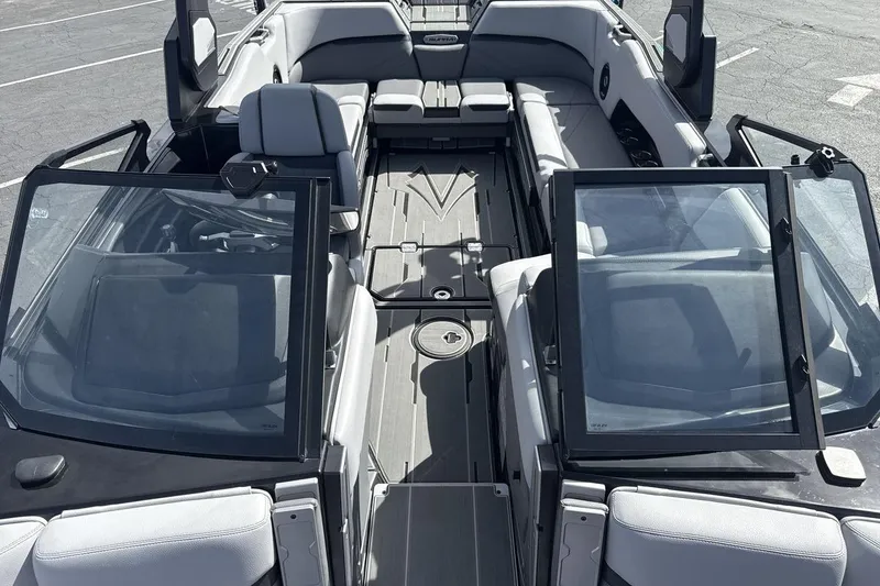 Slide: The Image of 2024 Supra SL 550 boat interior with spacious seating and modern design. - 12