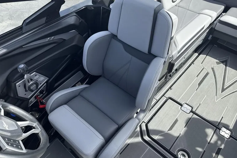 Slide: The Image of 2024 Supra SL 550 interior with sleek gray seating and modern controls. - 13