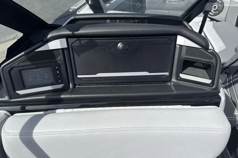 Slide: The Image of 2024 Supra SL 550 dashboard with sleek black and silver design, featuring modern controls. - 18