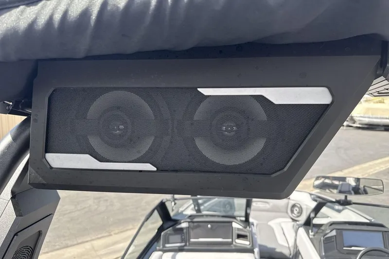 Slide: The Image of 2024 Supra SL 550 boat speaker system, featuring dual speakers in a sleek black enclosure. - 21