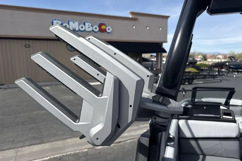 Slide: The Image of 2024 Supra SL 550 boat accessory detail with PTM bracket, outdoor setting. - 22