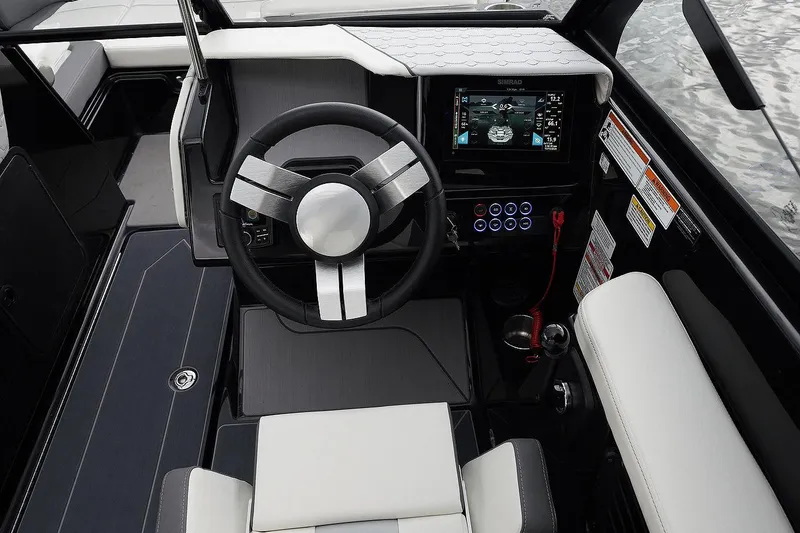 Slide: The Image of Manufacturer Provided Image: Interior of 2026 Heyday H22 boat with modern steering wheel and display. - 18