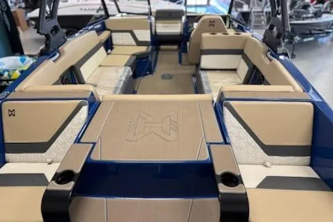 Slide: The Image of 2026 Heyday H22 boat interior with beige and blue seating, showcasing spacious layout. - 3