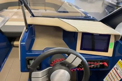 Slide: The Image of 2026 Heyday H22 boat dashboard with steering wheel and touchscreen display. - 6