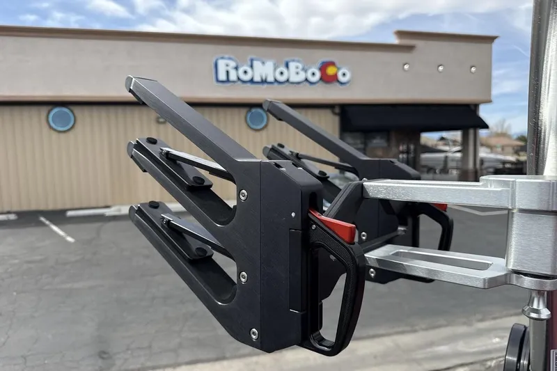 Slide: The Image of 2023 MasterCraft NXT22 boat accessory detail with RoMoBoCo building in background. - 22