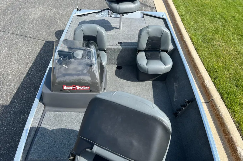 Slide: The Image of 2019 Tracker Bass Tracker Classic XL boat interior with seating and console. - 10