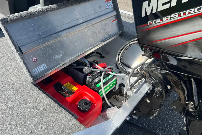 Slide: The Image of 2019 Tracker Bass Tracker Classic XL boat engine compartment with battery and fuel tank. - 14
