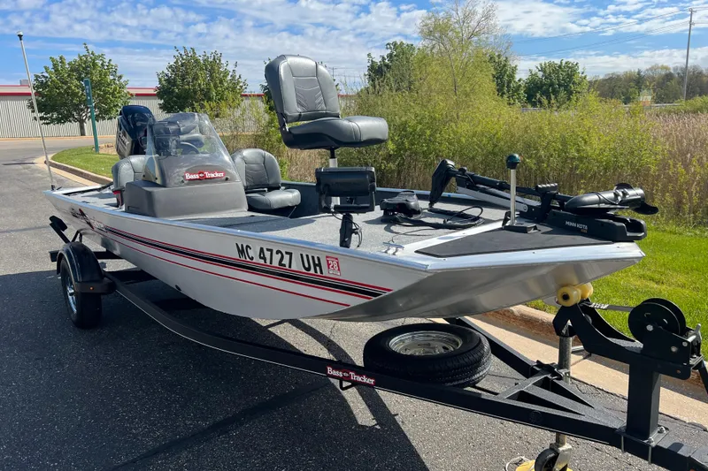 Slide: The Image of 2019 Tracker Bass Tracker Classic XL boat on trailer, parked outdoors. - 4