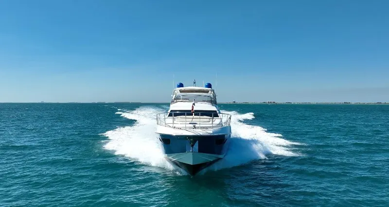 Slide: The Image of Azimut 70 yacht cruising on open sea, 2014 model, clear blue sky. - 18