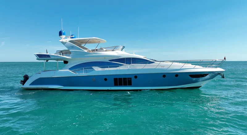 Slide: The Image of Luxury 2014 Azimut 70 yacht cruising on clear blue ocean waters. - 3