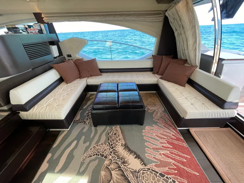 Slide: The Image of Luxurious interior of a 2014 Azimut 70 yacht with ocean view and elegant seating. - 43
