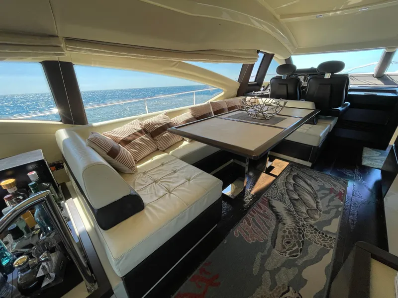 Slide: The Image of Luxurious interior of a 2014 Azimut 70 yacht with elegant seating and ocean view. - 45
