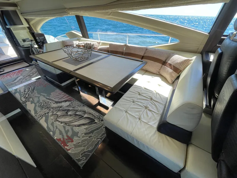 Slide: The Image of Luxurious interior of a 2014 Azimut 70 yacht with elegant seating and ocean view. - 46